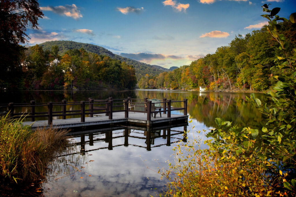 Rumbling Bald Resort at Lake Lure — pier with autumn foliage